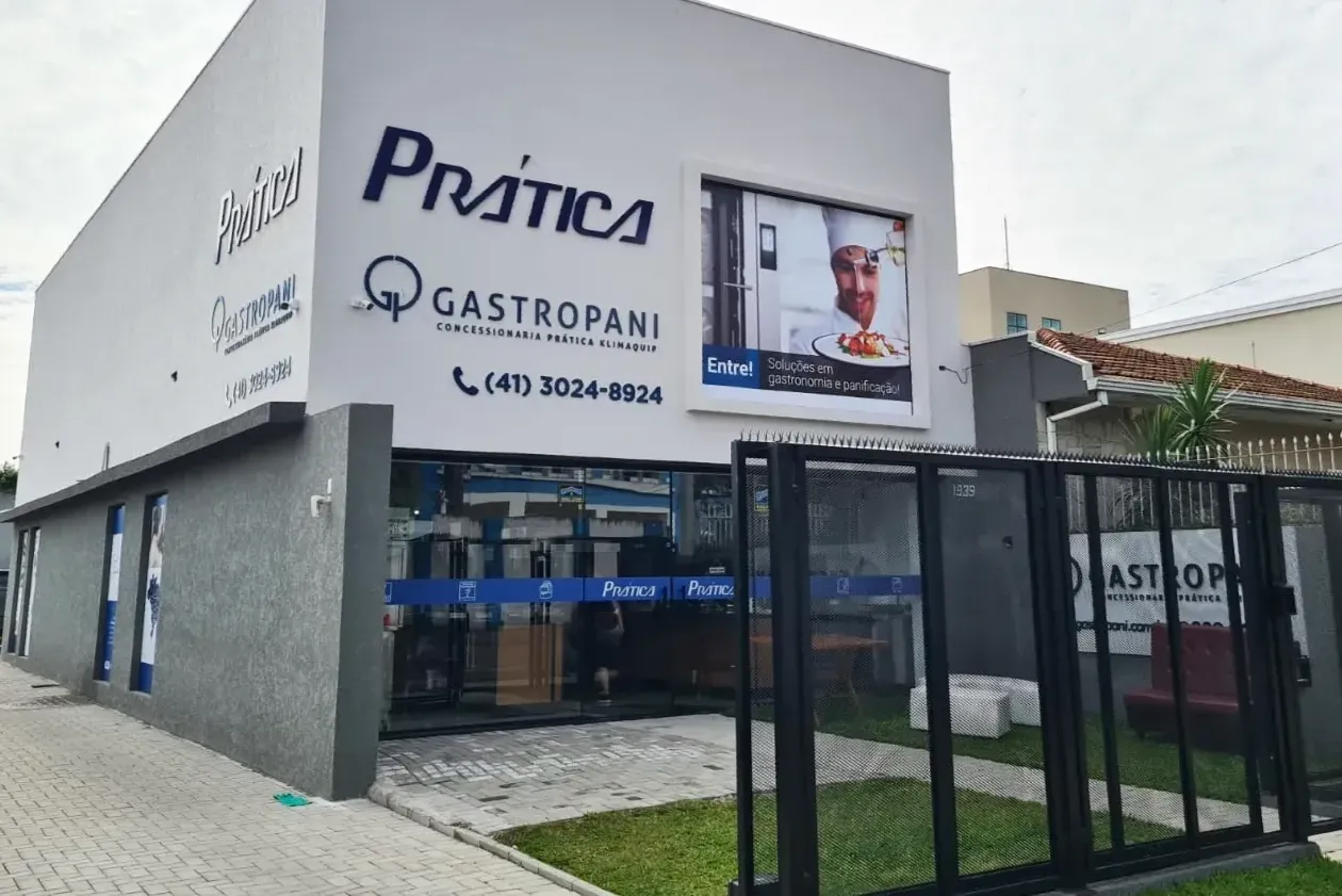 Um prédio com uma placa que diz prática gastropani