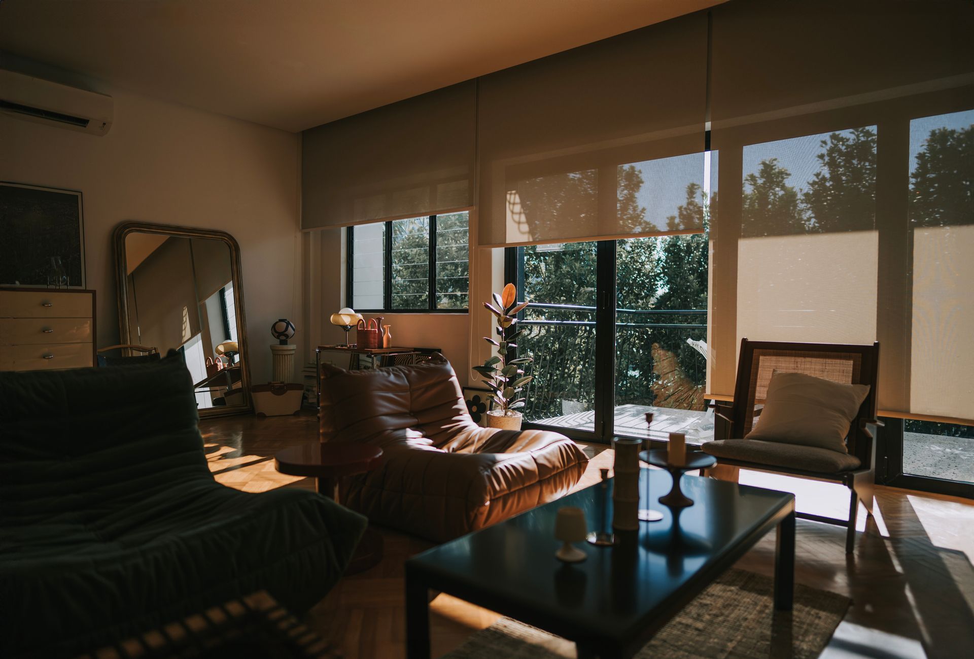 A close up of a window with blinds on it.