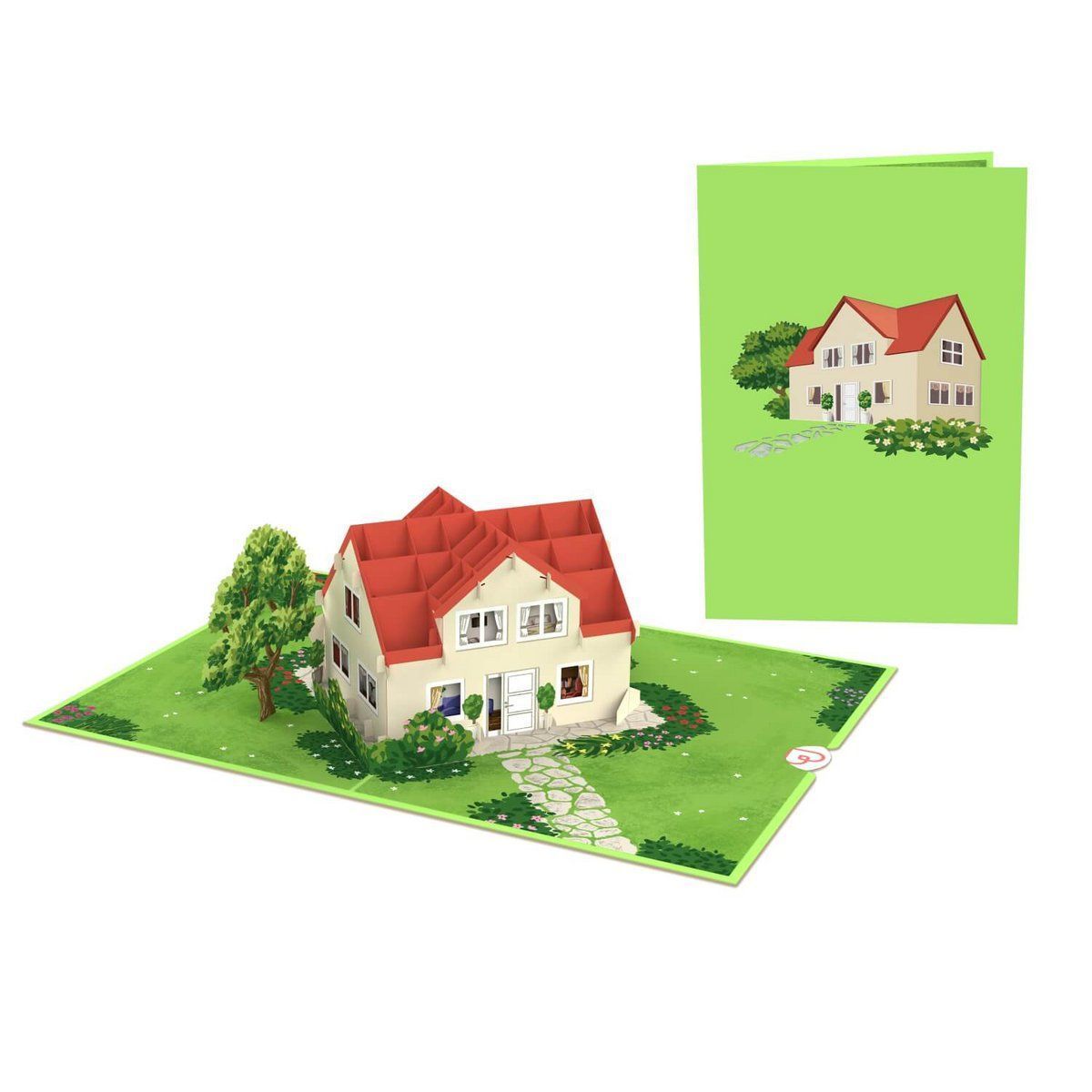 Miniatuurhuisje met rood dak op een groene sokkel, naast een bijpassend groen boekje.