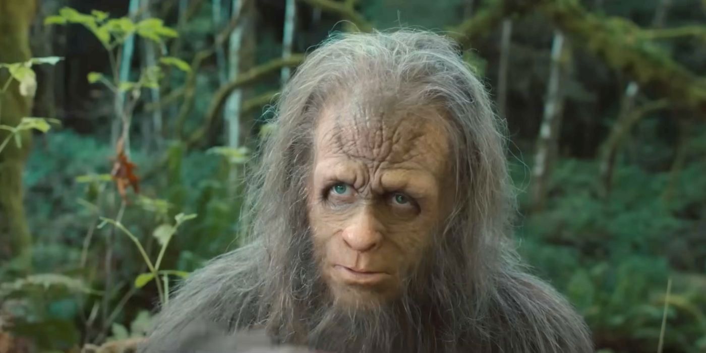 Bigfoot, or Sasquatch, with a serious expression, in a forest setting.