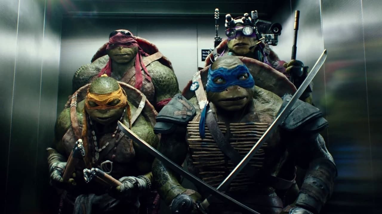 Four Teenage Mutant Ninja Turtles stand armed in a dark elevator, wearing masks and armor.