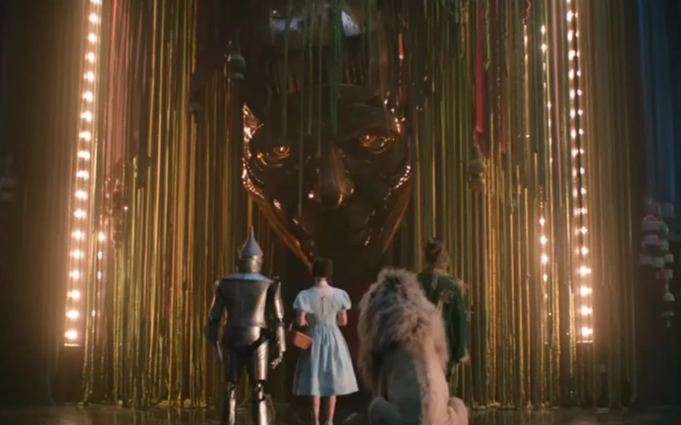 Dorthy and her gang meet The Wizard of Oz.