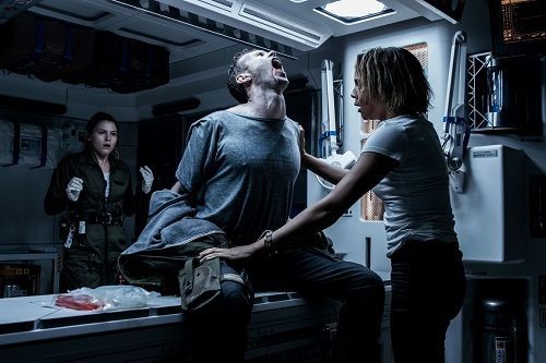 Man in distress, chest-bursting with a creature