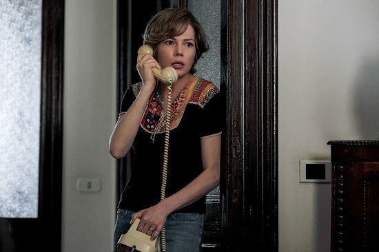 Woman with short hair on the phone