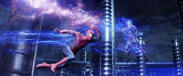 Spider-Man swings through blue electricity, battling Electro. The setting appears industrial.