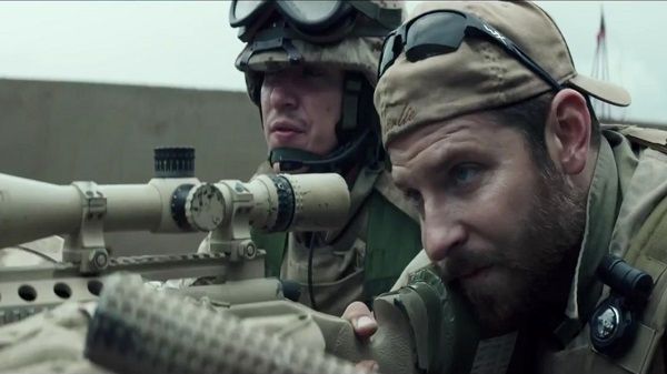 Two soldiers looking through a sniper scope in a warzone setting