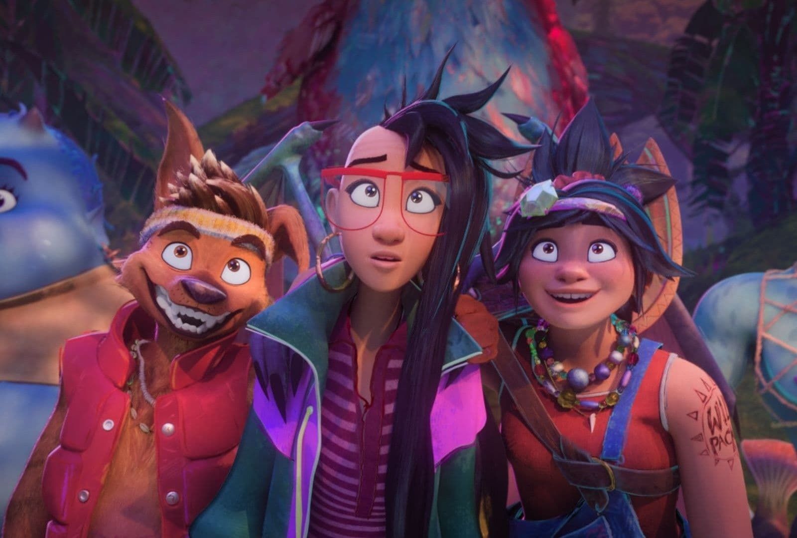 Three smiling animated adventurers in colorful outfits standing in a glowing forest