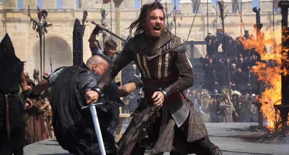Man in medieval garb fights with a sword