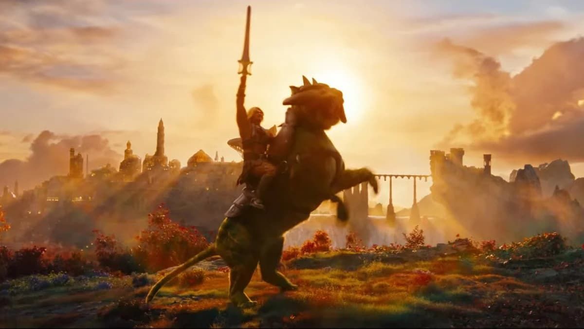 Silhouette of a warrior raising a sword on a hill at sunrise, with ancient ruins in the background