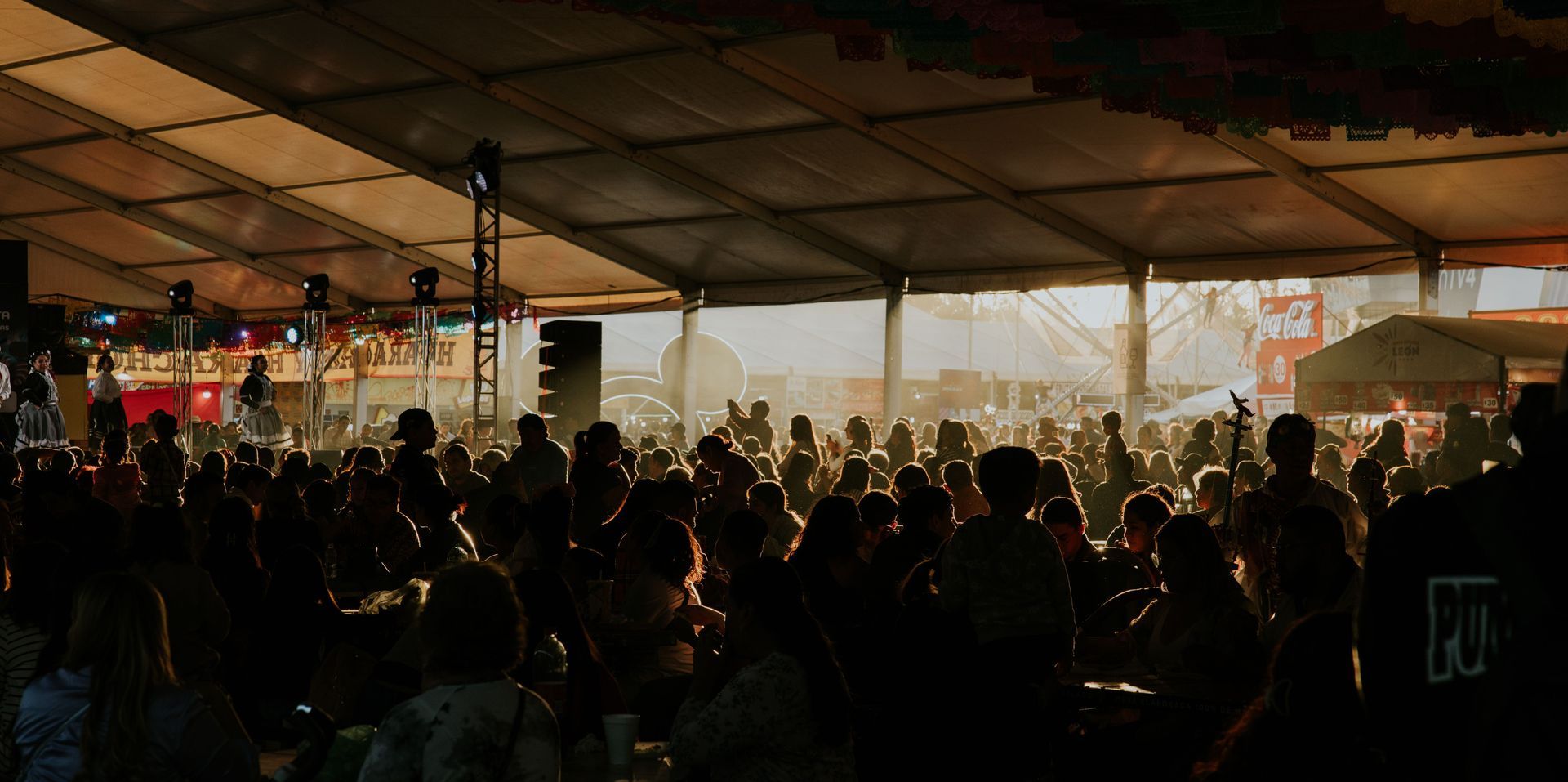 A crowd gathered at an evening community event