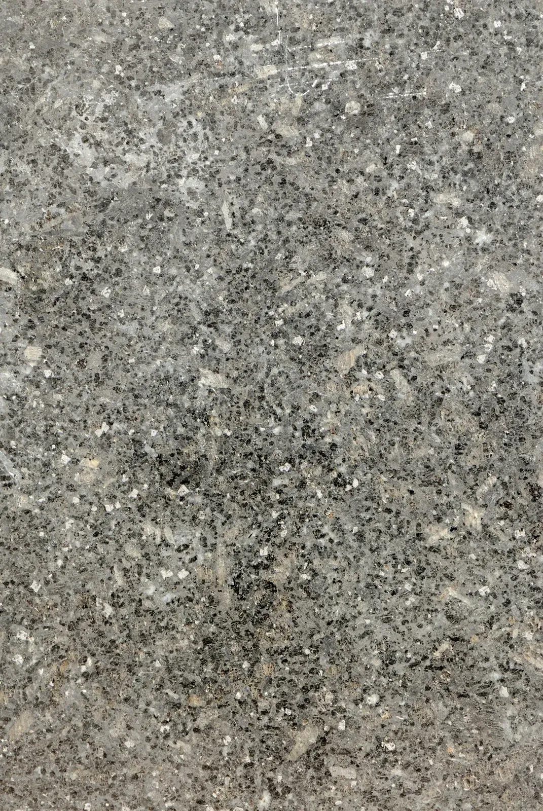 Close-up of speckled gray stone or granite texture