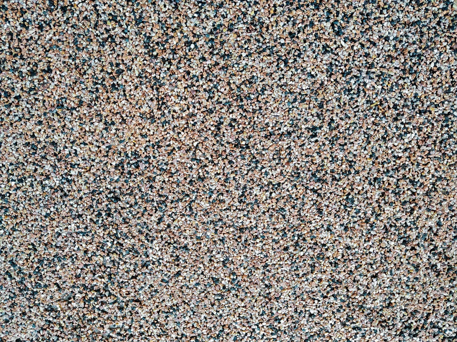 Static noise pattern in gray, blue, and tan speckles