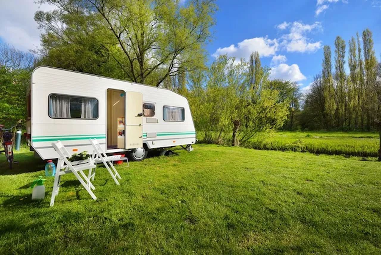 Caravan on a Grassy Field — ASAP Towing Pty Ltd In Tiaro, QLD