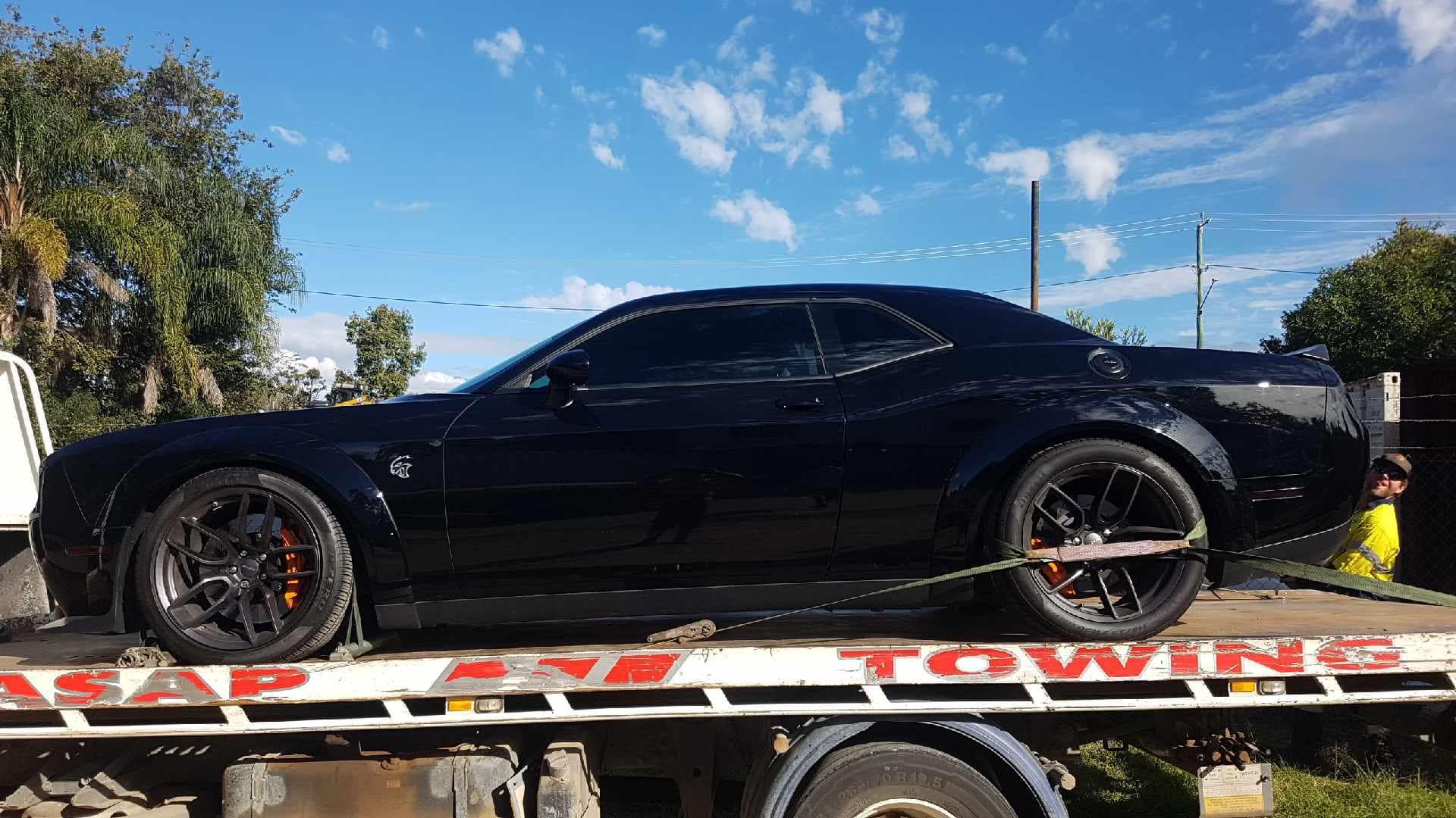 Black Dodge Challenger on a Tow Truck — ASAP Towing Pty Ltd In Tiaro, QLD