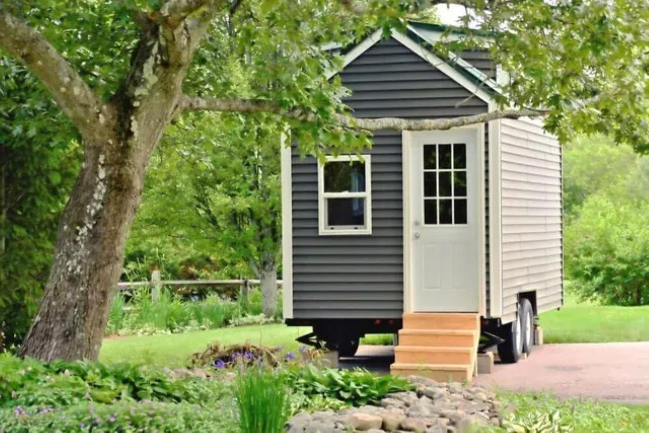 Tiny House on Wheels With Grey Siding — ASAP Towing Pty Ltd In Gympie, QLD