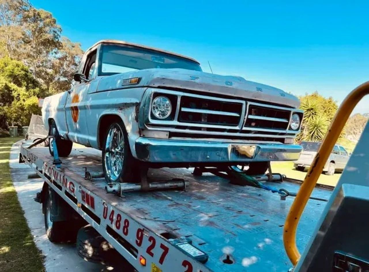 A Classic White Pickup Truck on a Tow Truck — ASAP Towing Pty Ltd In Rainbow Beach, QLD