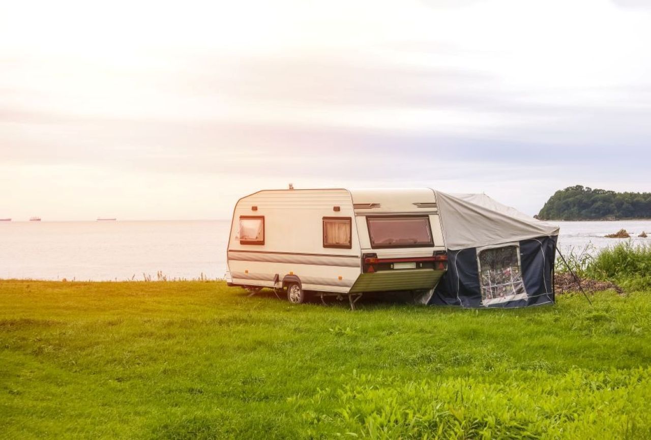 Camper Parked on Grassy Shore by the Ocean — ASAP Towing Pty Ltd In Cooroy, QLD