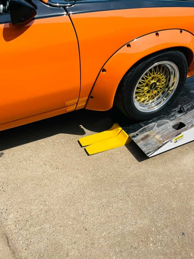 Orange Classic Car on a Concrete Surface — ASAP Towing Pty Ltd In Gympie, QLD