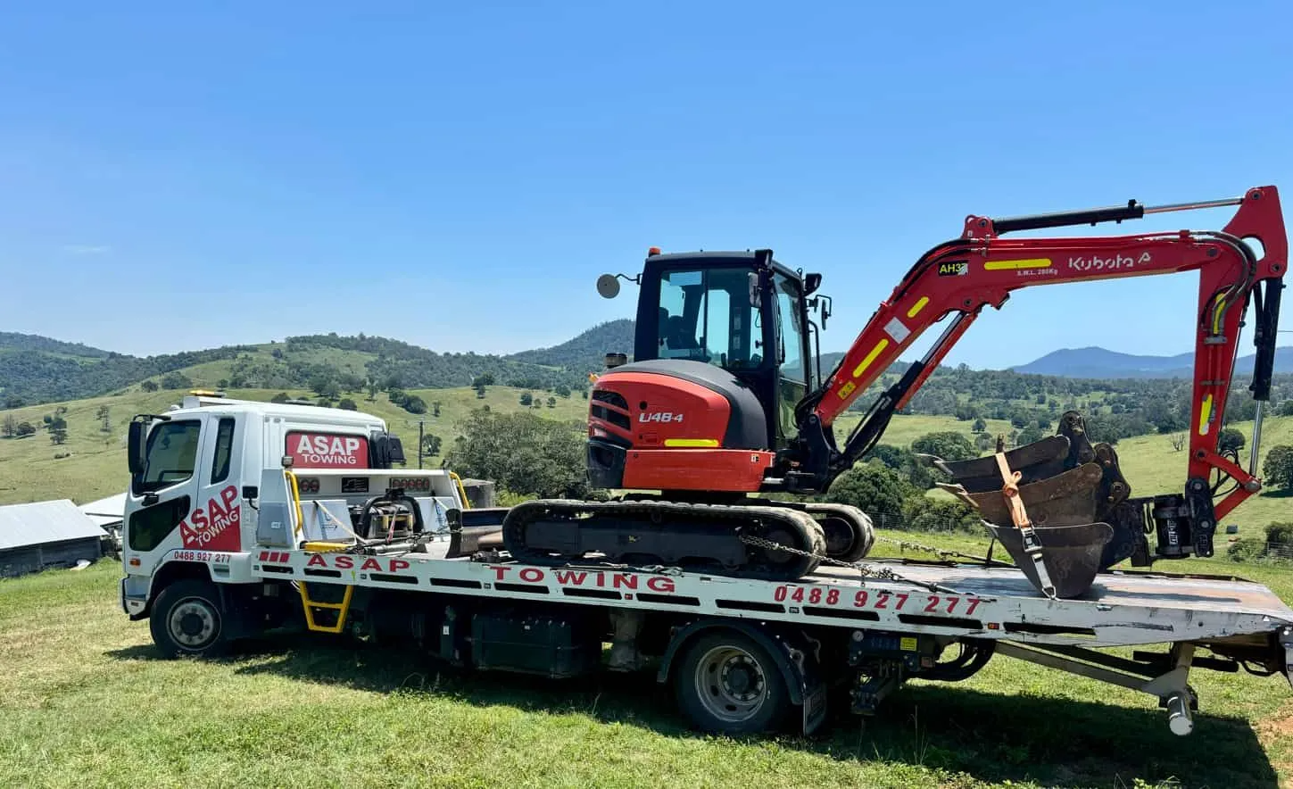 Excavator on a Tow Truck — ASAP Towing Pty Ltd In Gympie, QLD