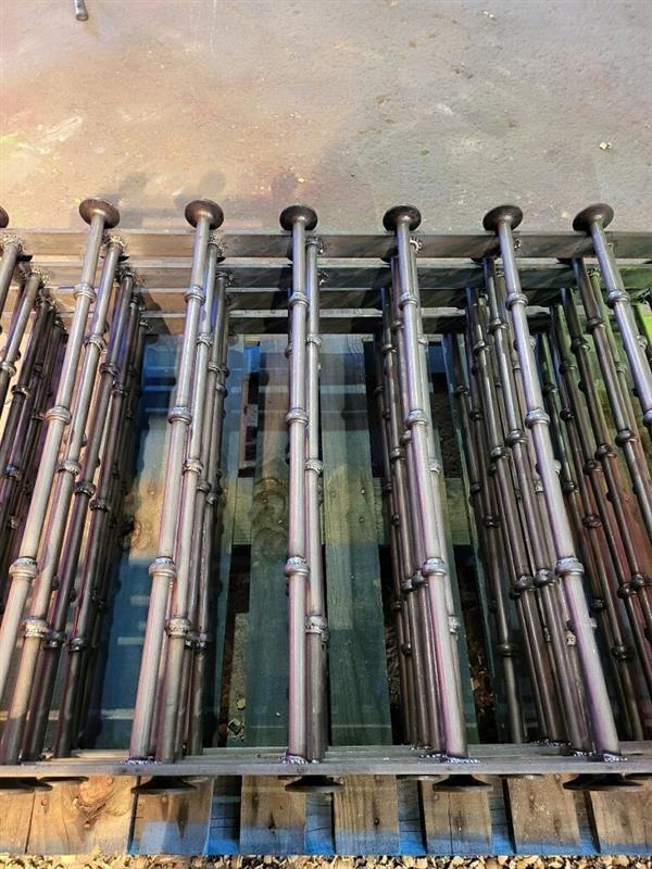 A stack of Stud Rail assemblies with Piggyback Welded studs