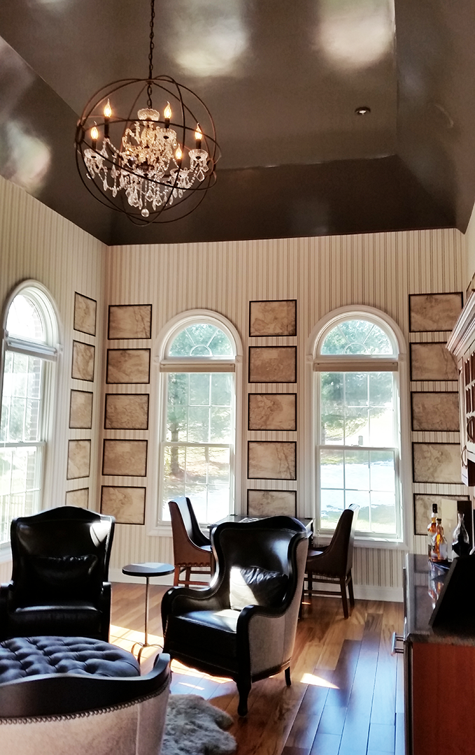 A living room filled with furniture and a chandelier.