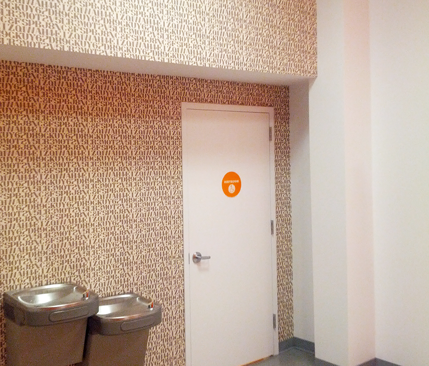 A bathroom with a door that has the number 6 on it