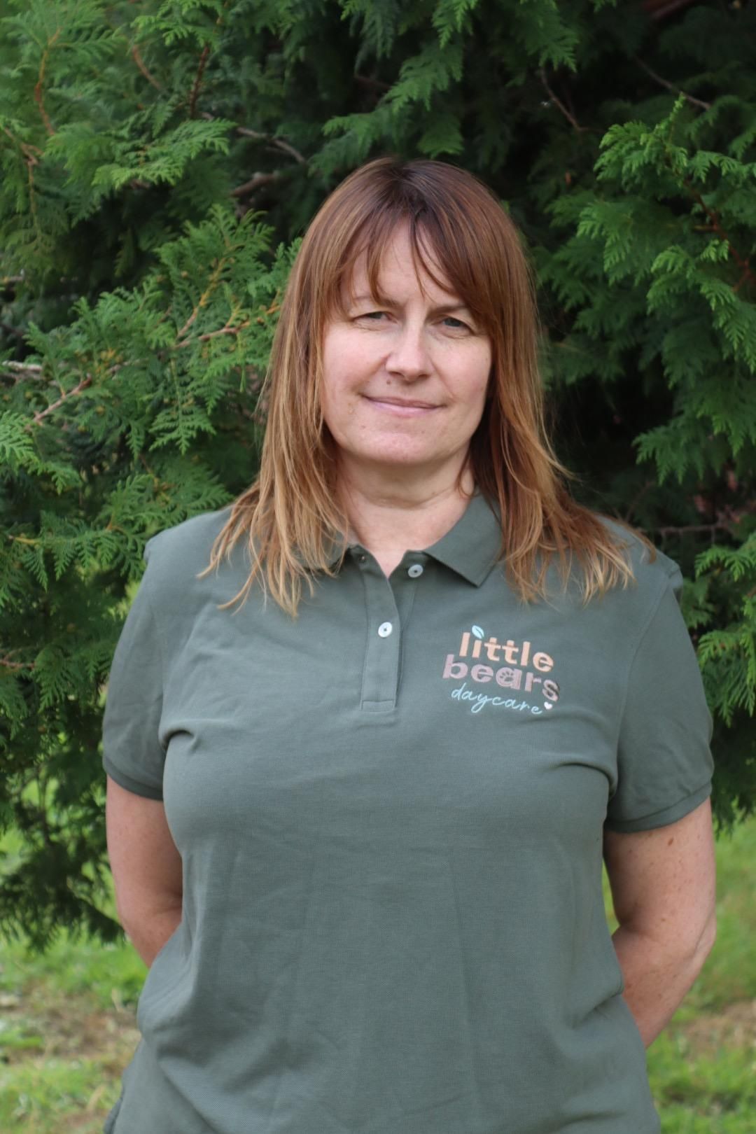 Woman in green shirt with 