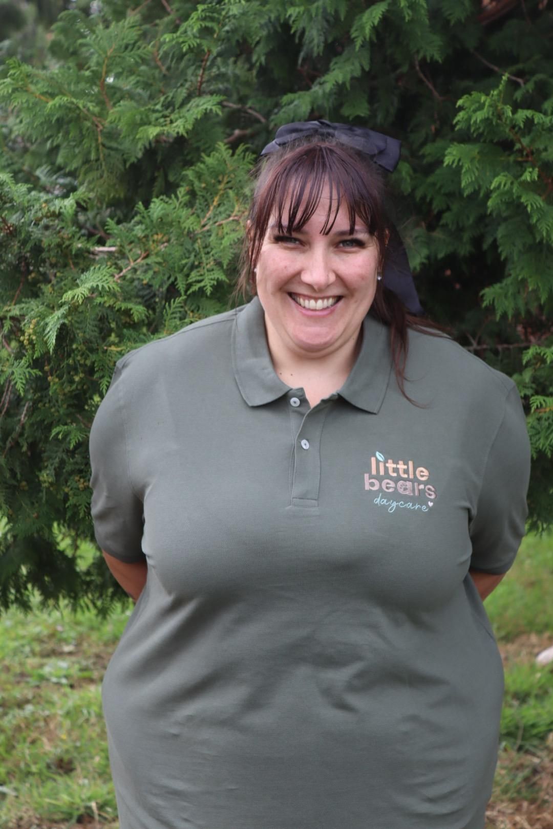 Woman in green polo shirt, 