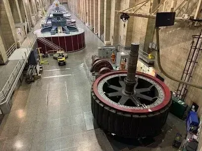 Mobile Detailing-Interior of a power plant with large electrical generators, industrial setting.