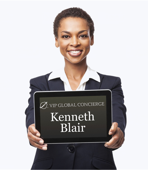 Woman in suit holding a tablet displaying 
