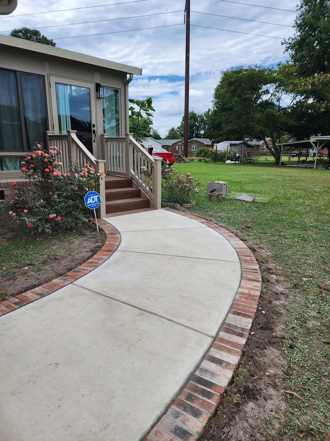 Concrete Walkway Leading to Home — Kinston, NC — Hugo's Concrete LLC
