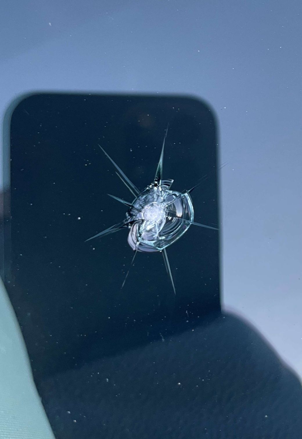 Windshield Repair Windshield chip that cracked from a rock hitting the glass in need of a windshield repair.