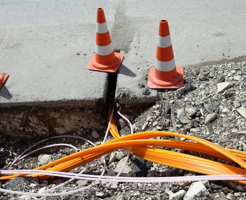 Traffic Cones and Electrical Wires on the Ground — Hennig Electrical Services in Caloundra, QLD
