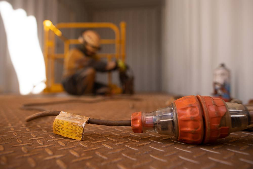 Electrical Device Attached On Power Cord — Hennig Electrical Services in Nambour, QLD