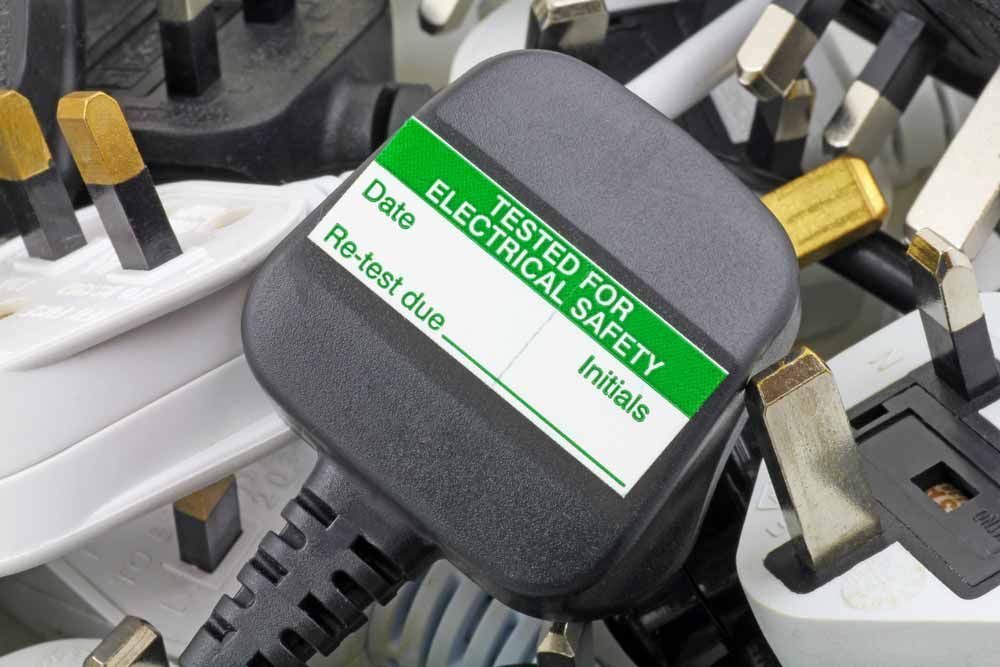 Three Pin Plugs With Test Sticker — Hennig Electrical Services in Nambour, QLD