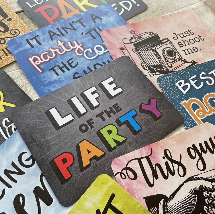 A bunch of cards with one that says life of the party. Photo Booth Props. Rent a Photo Booth Las Vegas.
