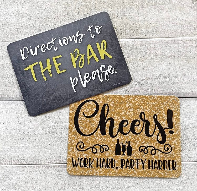 Two signs that say directions to the bar please and cheers. Las Vegas Photo Booth Rental.