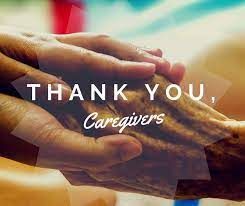 A close up of a person holding another person 's hand.
