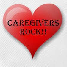 A red heart with the words `` caregivers rock '' written on it.
