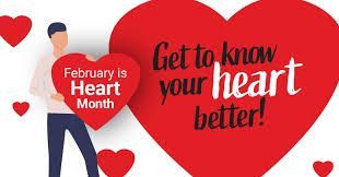 February is heart month and a man is holding a red heart.