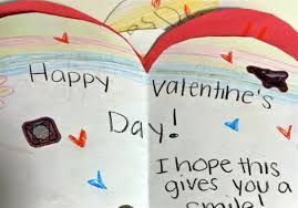 A valentine 's day card with a drawing of a heart on it.