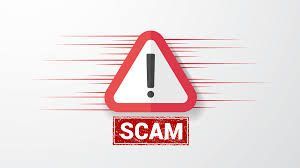 A red warning sign with an exclamation point and the word scam.