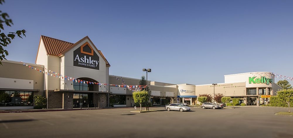 Exterior view of a shopping center with 