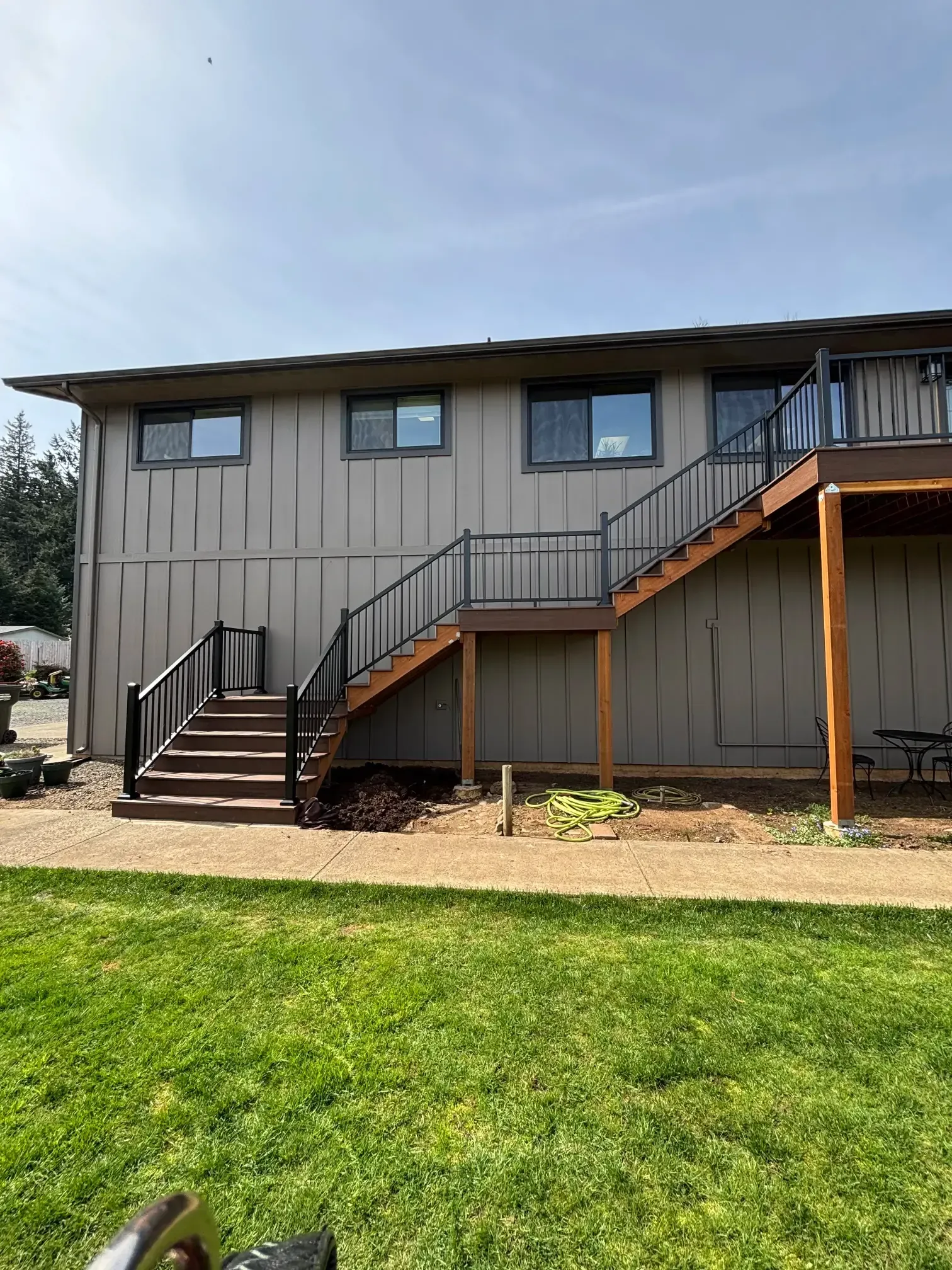 View of the deck integrated with the lawn area.