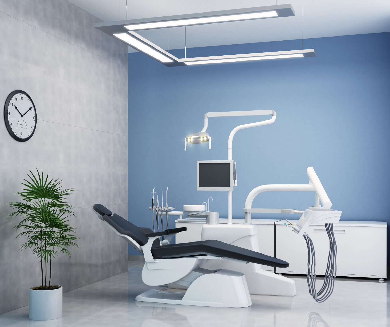 Dental office interior with dental chair, equipment, and a clock.