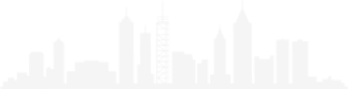 Silhouette of a city skyline, with tall buildings and a communications tower.