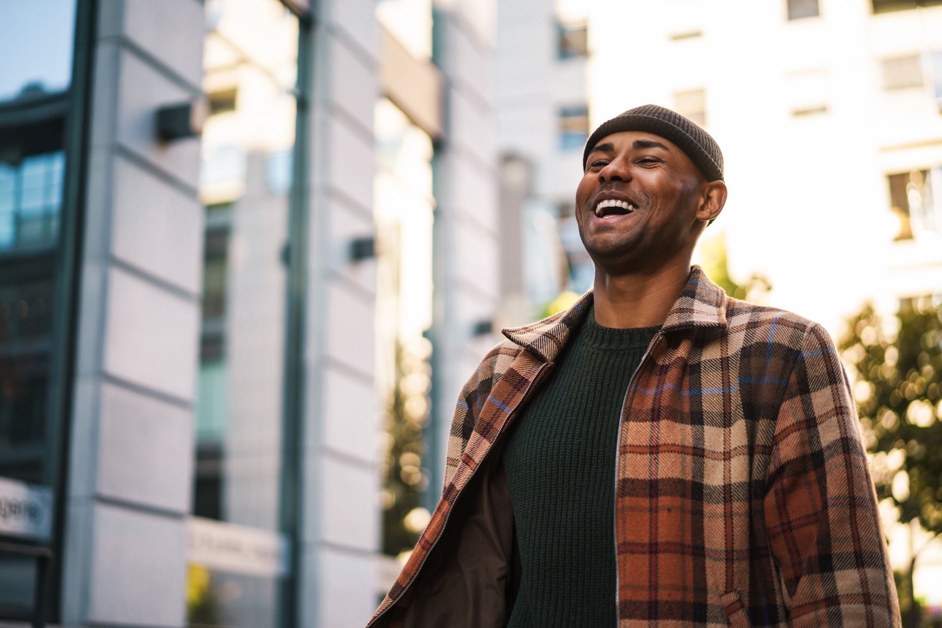 Confident smiling man walking outdoors