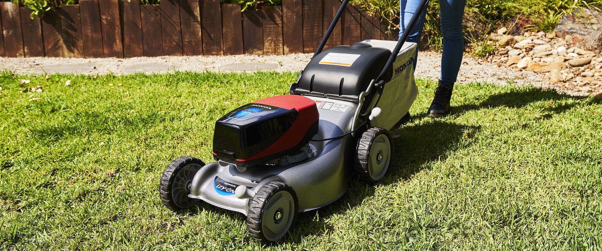 Red and Silver Lawn Mower — Great Lakes Mowers & Chainsaws In Hallidays Point, NSW