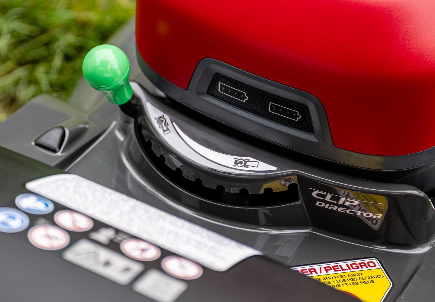 Close-up of a Red and Black Machine Control Lever — Great Lakes Mowers & Chainsaws In Smiths Lake, NSW