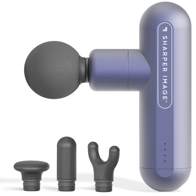 Purple handheld massage gun with three interchangeable attachments on white background